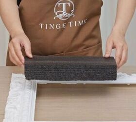 She places a block of floral foam on a picture frame for this surprisingly easy decor idea