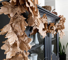 Recycled paper Fall leaf garland styled on a black hutch