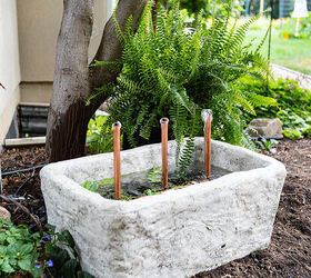 Outdoor Garden fountain placed near the patio with bubbling water