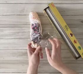 Wrap a cheap Barbie doll in Saran Wrap for the coolest fall idea we've seen all month