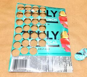 Cut holes in used soda cans for an idea that's as thoughtful as it is beautiful