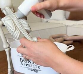 Why gluing the spine of a Dollar Tree plastic skeleton will make trick-or-treaters smile this Halloween