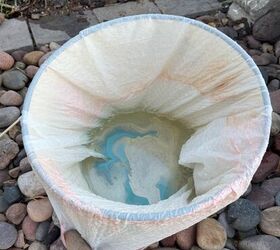 Pour nail polish into a trash bag for this stunning refresh