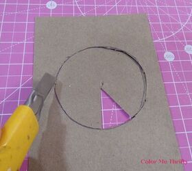 repurposed clothes pins into fall flowers, cutting out template for spray painting top of straw hat