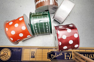 We need a whole bunch of ribbon spools to copy this perfect fall idea