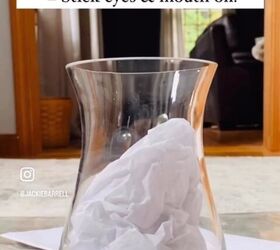 Stuff tissue paper into a bunch of glass vases for spooky yet cute decor