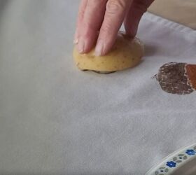 Press a half of a potato on a piece of fabric for one of our favorite fall ideas