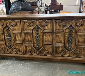 She gave this vintage dresser a breathtaking and modern update while still preserving its ornate beauty