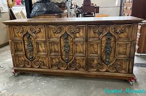 She gave this vintage dresser a breathtaking and modern update while still preserving its ornate beauty