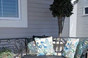 Prevent porch pillow flyaways with this easy hack