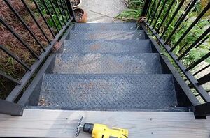 The satisfying trick they used to update these rusty stairs