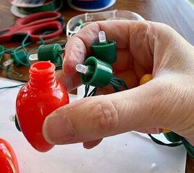 She unscrewed the bulbs off a string of Christmas lights for charming holiday decor
