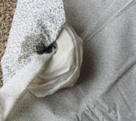 Wrap a piece of fabric around a roll of toilet paper for beautiful farmhouse-style decor