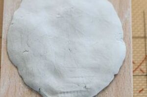 Put some clay in molds for classic Christmas decor