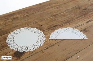 Fold a doily in half to add a touch of whimsey to your Christmas decor