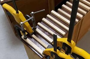 She glues a bunch of wooden slats on an old dresser drawer for this jaw-dropping upgrade