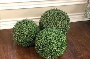 She takes these 3 topiaries outside for beautifully festive seasonal decor