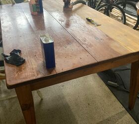 She stripped the paint off this trashed table to make it fit her decor BEAUTIFULLY