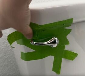 She sticks tape on her toilet for this wildly impressive upgrade