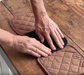 She glues 3 dollar store potholders together for this totally useful home addition