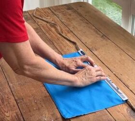 Gluing twine and folding top of placemat