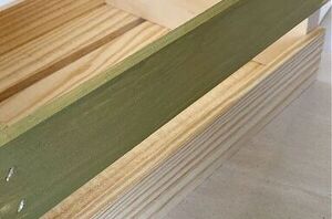 She paints a wooden crate for exquisitely unique table decor