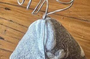 Twist wire around a rock to make plants look SO good in your home