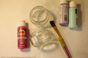 Instead of tossing these little jars, she grabbed some paint for extra-cute storage