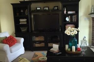 She gave this entertainment center such a bright and vibrant glow-up