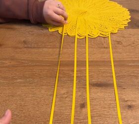 kitchen window decor, Use different string lengths to create a staggered hanging effect