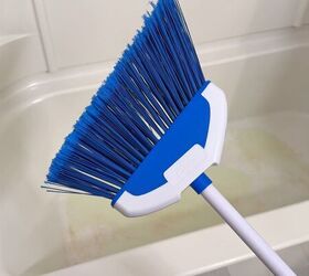 deep clean your shower floor, Clean your shower with a broom to protect your back