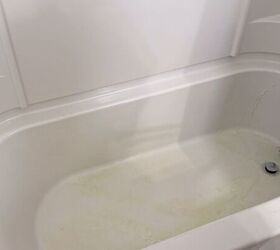 deep clean your shower floor, Broom scrubbing helps clean the entire shower without getting on your hands and knees