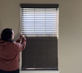 Horizontal blinds adjusted for natural light and lower-level privacy