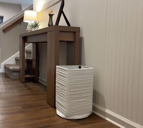 A gorgeous basket made with just rope and a stool