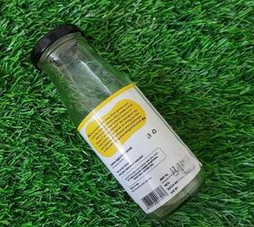 She wraps this empty glass bottle with jute rope for this charming 30-minute decor idea