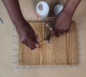 Pushing paper towel holder through slit