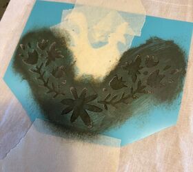 She pressed stencils on some fabric to give her kitchen windows a beautiful update