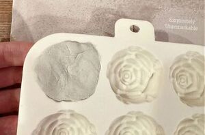 Stuff clay into silicone molds to make pottery more interesting