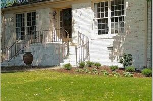 We loved watching these pros limewash the exterior of this home (and so will you!)