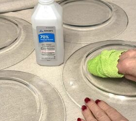 Rub alcohol on glass plates to give them a timeless and elegant look