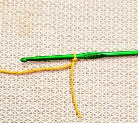 Use golden colored yarn to for this idea that will make your table magazine worthy