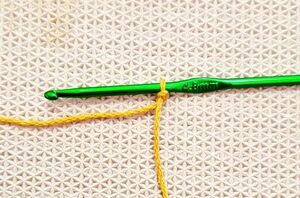 Use golden colored yarn to for this idea that will make your table magazine worthy