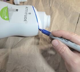 Cut the tops off of used shampoo bottles to make them look super high-end