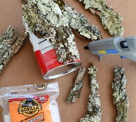 She glues pieces of tree bark to a tin can for this beautiful springtime idea