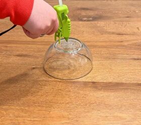 Gluing two clear bowls together to create the pedestal base for a rope candle holder