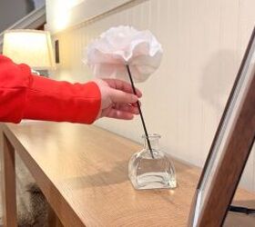 diy paper towel flower diffusers, Paper towel flower diffuser sitting in a jar of essential oil
