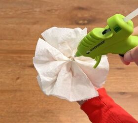 diy paper towel flower diffusers, Gluing diffuser stick to bottom of paper towel flower
