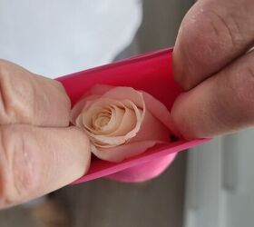 She stuffs a rose into a balloon for this elegant decor hack