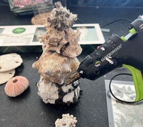 Stack seashells for one of the most elegant St. Patrick's Day decor ideas we've seen in a while