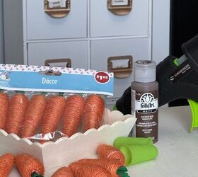 Who knew you could make beyond adorable Easter decor with some faux carrots and a little basket from the Dollar Tree?